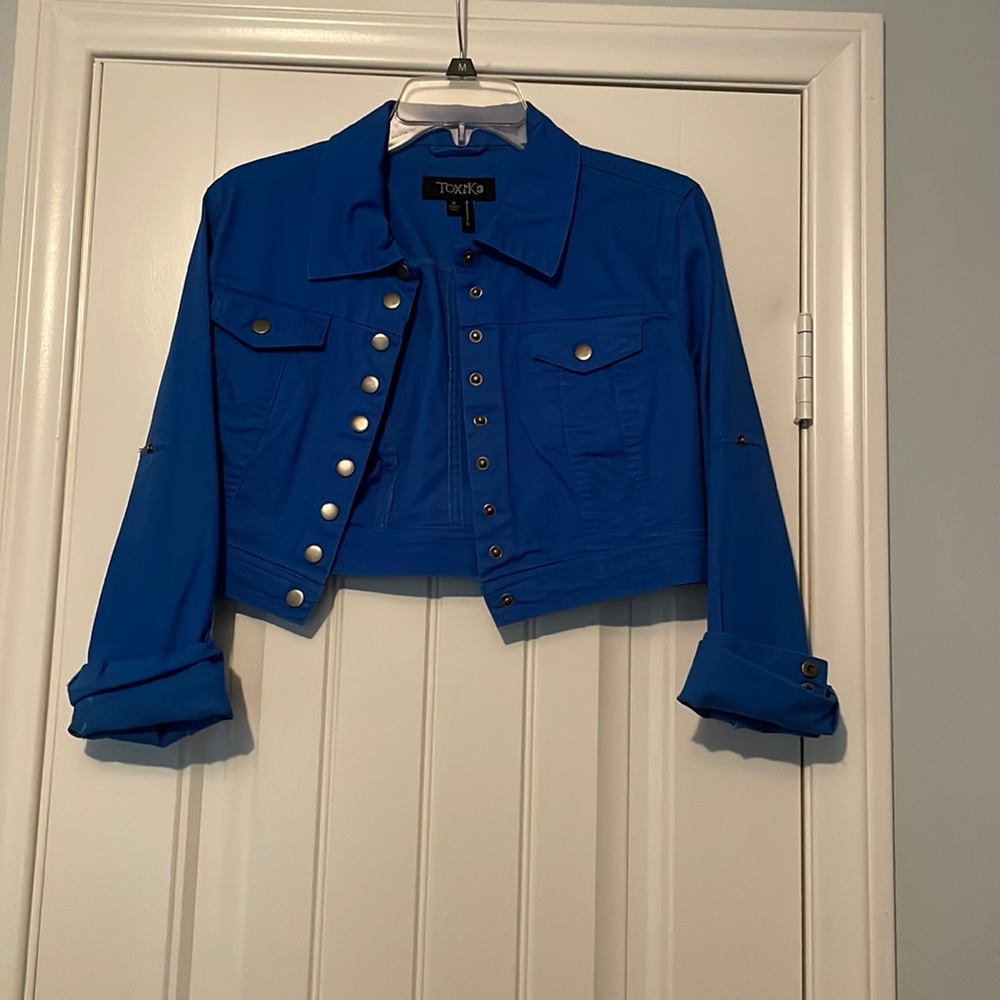 Blue short jean jacket.